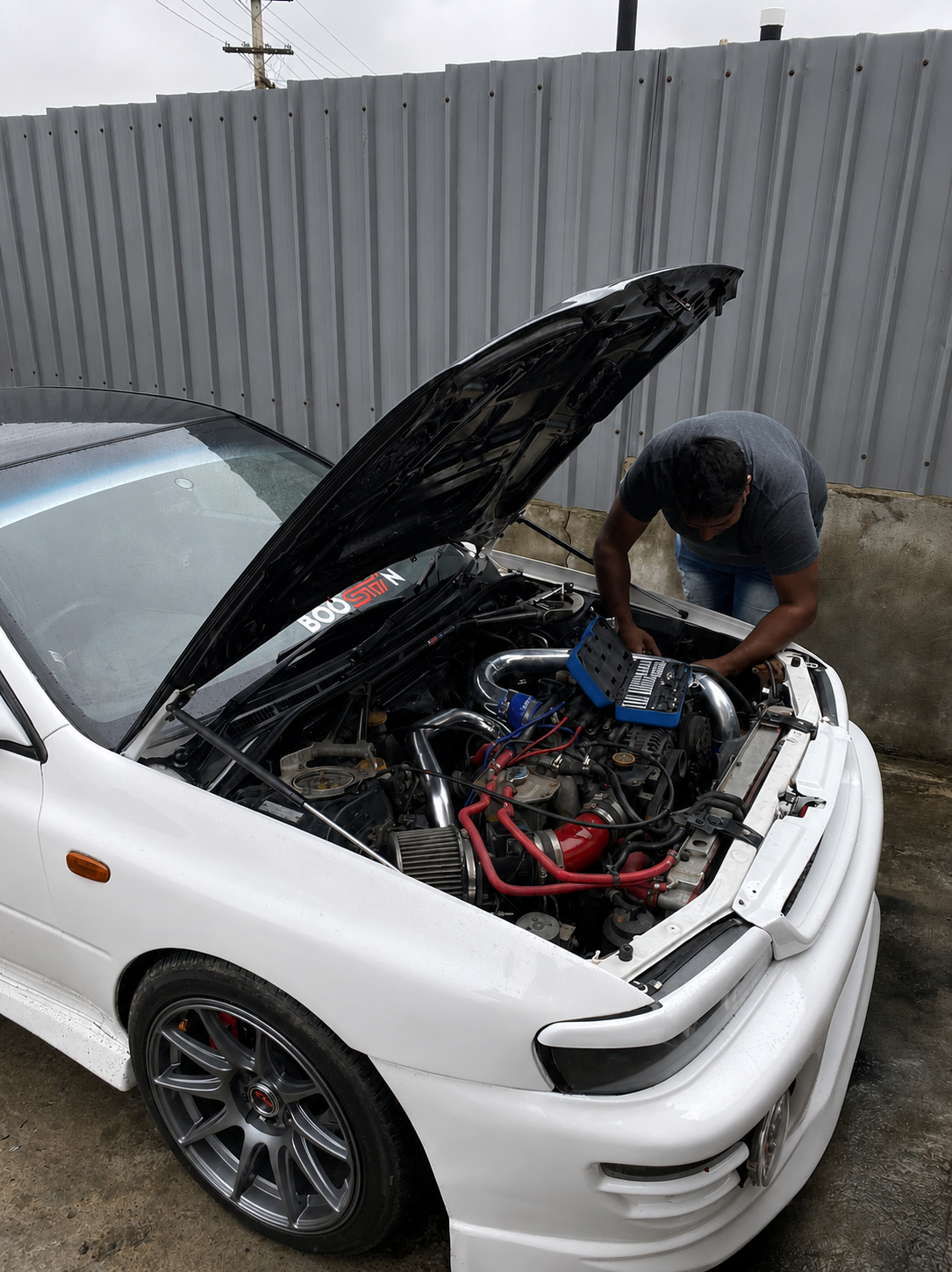 The Auto Wiz mechanic at work